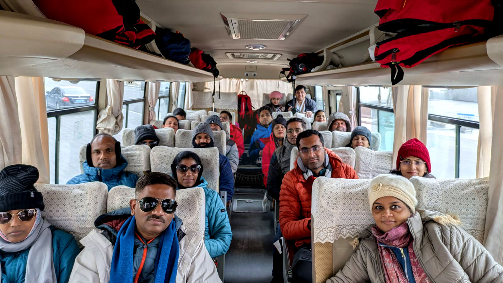 Pilgrims comfortably seated in safe and relaxing transport during a spiritual journey