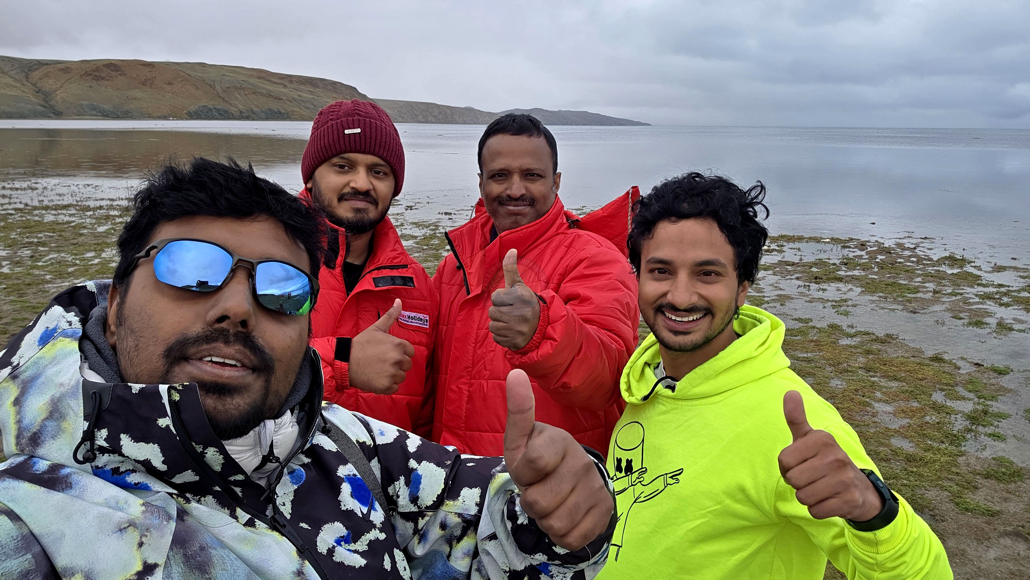 Smiling yatris enjoying companionship and spiritual peace during Kailash Yatra
