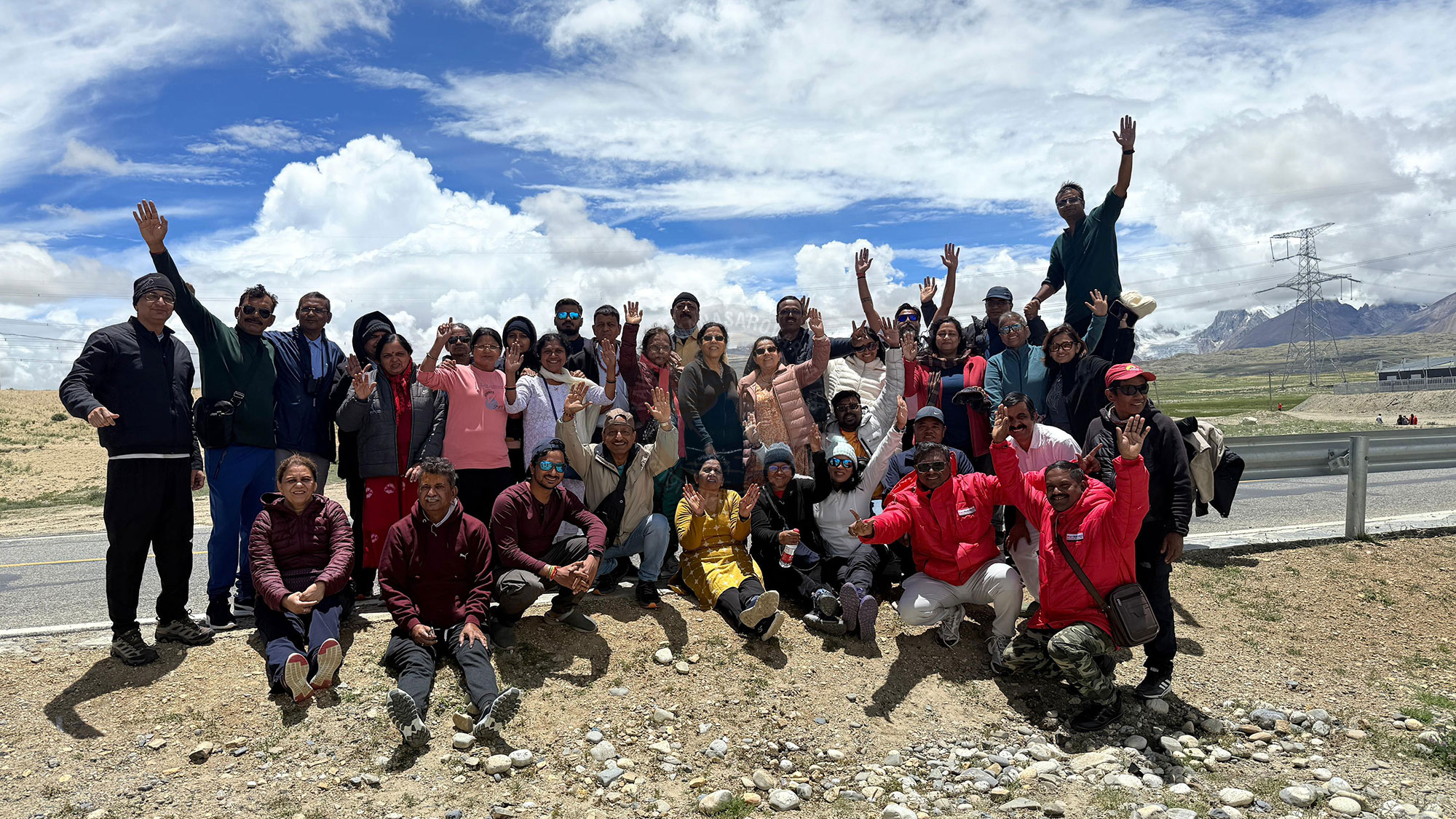 Pilgrims engaged in deep contemplation during their spiritual journey at Mount Kailash