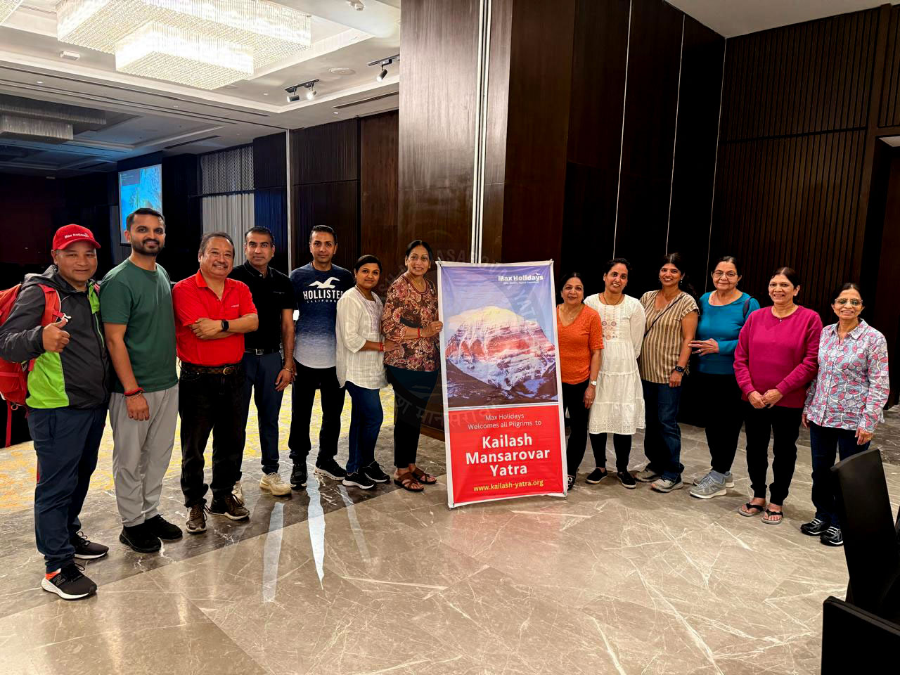 Pilgrims excitedly gathering at the beginning of the Kailash Yatra, forming a dynamic spiritual community