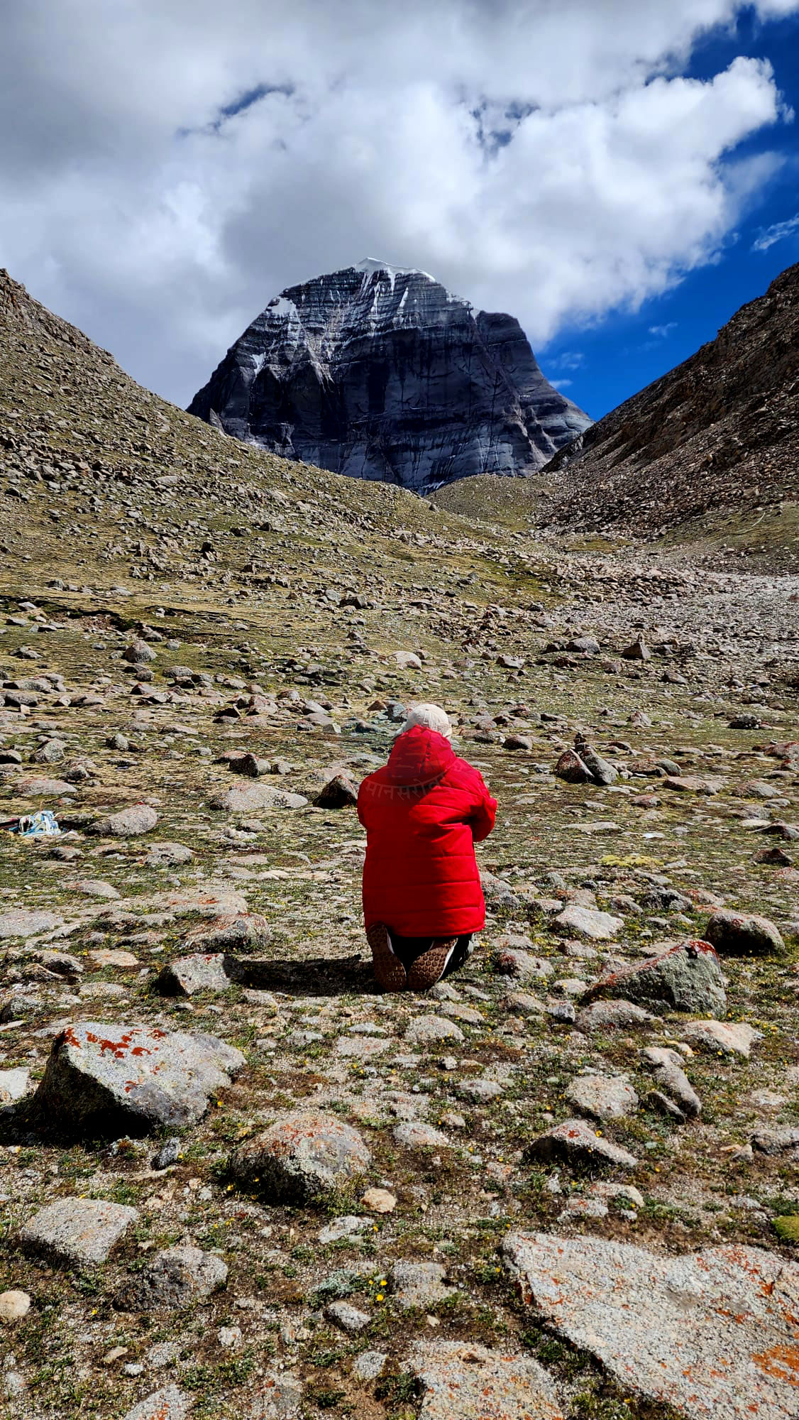 Pilgrims experiencing deep emotions during Kailash Mansarovar Yatra, from quiet contemplation to elation at the pilgrimage site