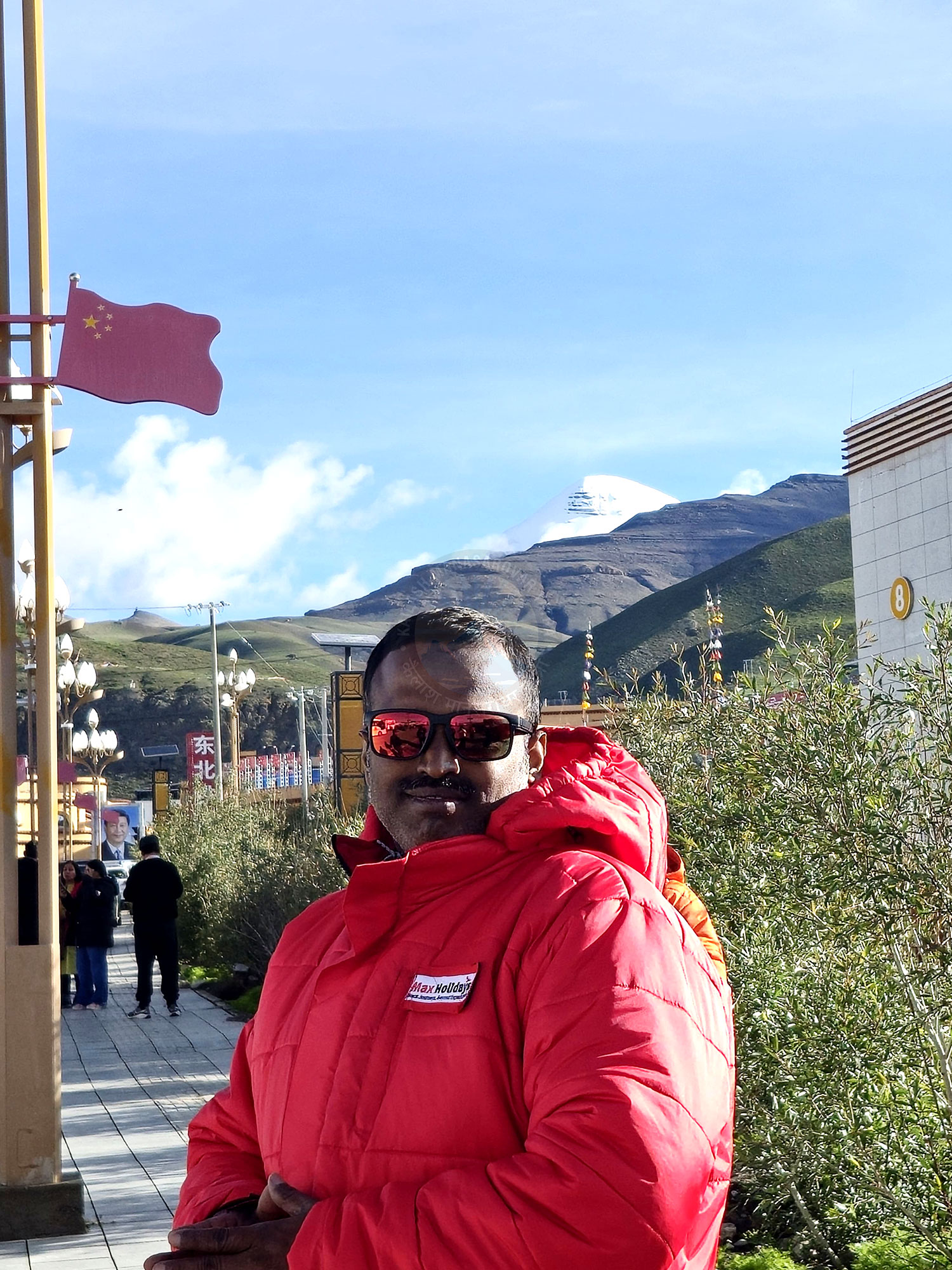 Tourists enjoying the stunning view of Mount Kailash in Tibet and China, blending spiritual journey with cultural discovery