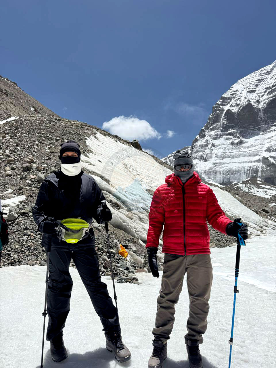 Pilgrims walking through high-altitude snow during the Kailash Kora, showing faith and determination