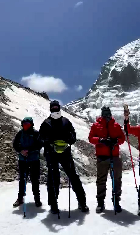 Four people trekking at Mount Kailash Yatra