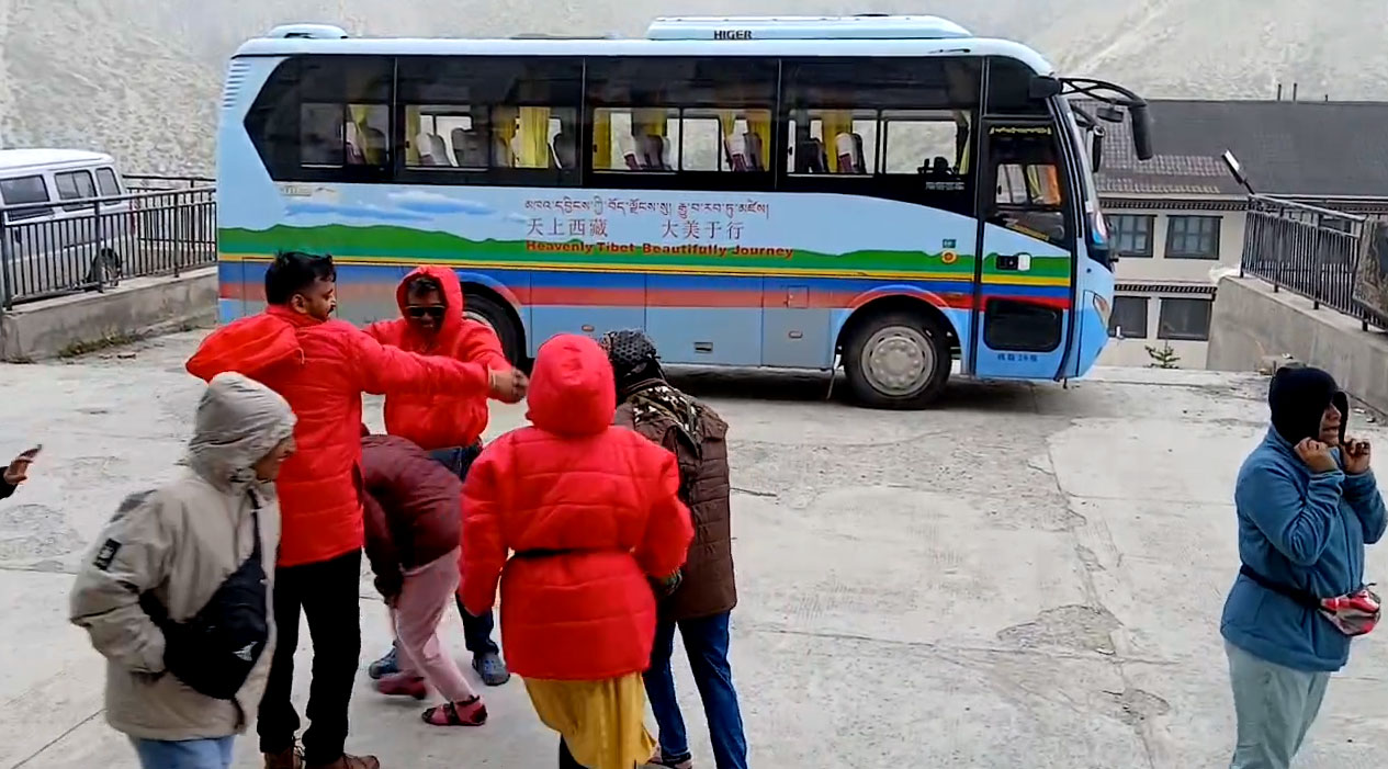 Pilgrims playing games in bus during Mount Kailash Yatra journey
