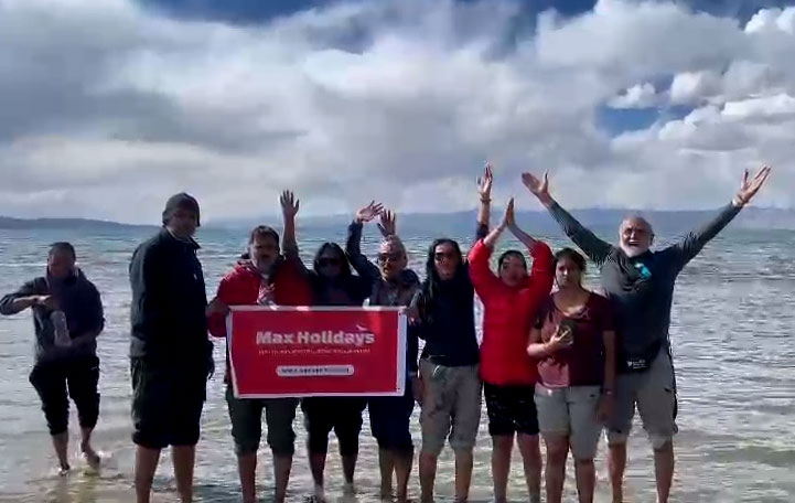 Yatri at Lake Mansarovar experiencing spiritual bliss